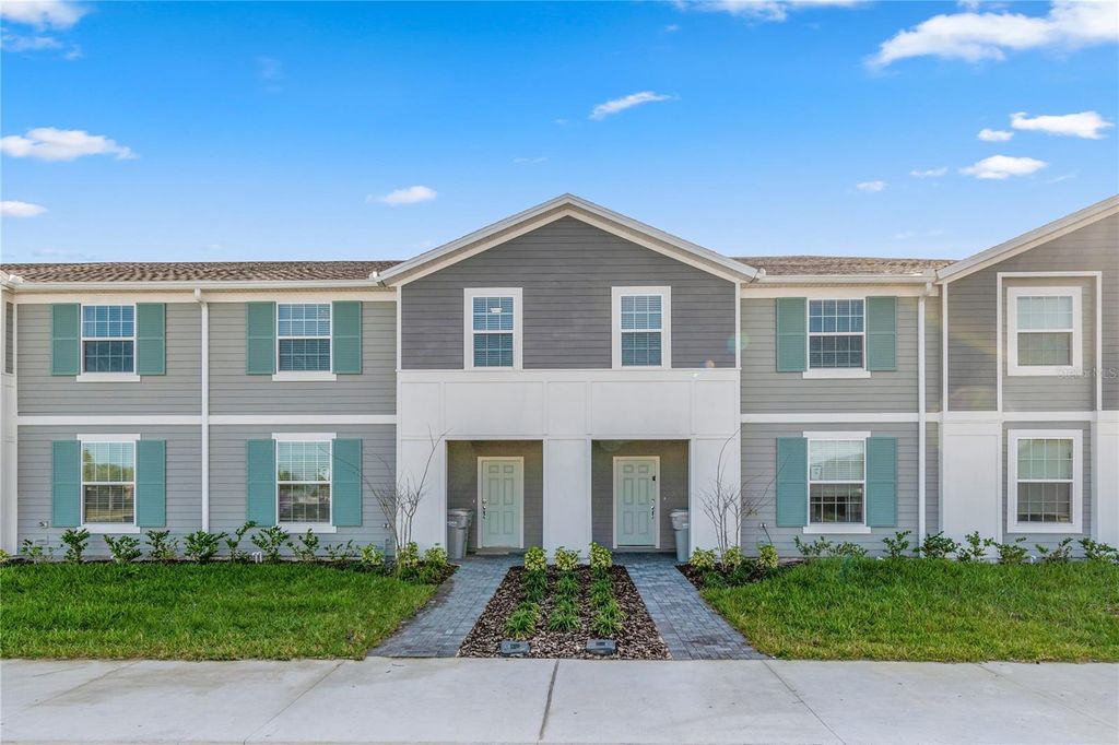 Photo of 710 Gardenia Lane, Davenport, FL 33897 (MLS # O6376771)