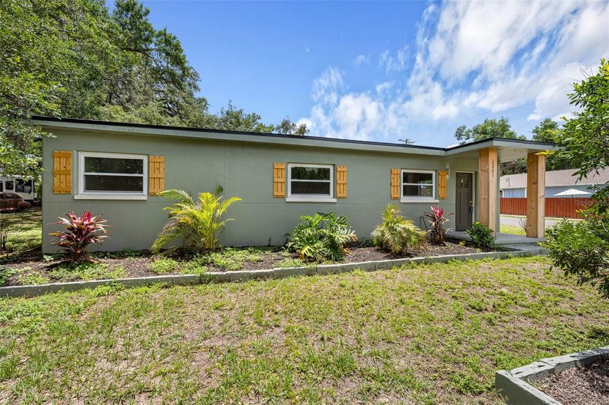 In the steadily developing east Seminole Heights area is the very nicely renovated three bedroom two bath solid block home on a corner lot close to Erwin Technical College. Many upgrades include a new roof, large kitchen with new cabinets, quartz counters and stainless appliances, new luxury vinyl flooring for durability and care, bathrooms that have been renovated with tub in secondary and the primary bath has a walk in shower as well as dual sinks. Home has a split plan and also has been painted in neutral tones. Oversized garage and fenced back yard are additional pluses. The area is flood zone X which does not require any flood insurance. In addition to everything else, the home has a very welcoming feel.