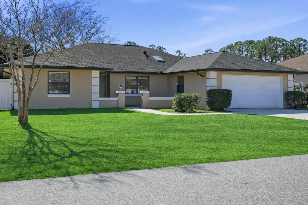 Photo of 34 Beth Lane, Palm Coast, FL 32137 (MLS # FC316176)