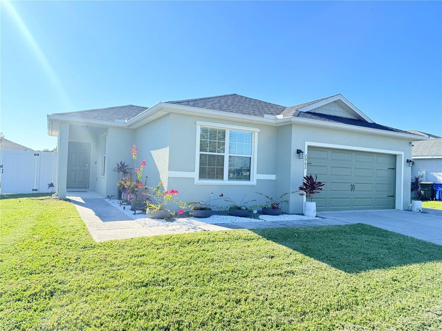 POND VIEW | NEW A/C 2025 | MOVE-IN READY | SCREENED LANAI. Welcome to this meticulously maintained 3-bedroom, 2-bathroom home with a spectacular front pond view, new A/C (2025), recent exterior paint, and stainless steel appliances. This move-in ready residence features a bright split floor plan filled with natural light—ideal for comfortable living and entertaining. The kitchen features ample cabinet space and quartz countertops and backsplash. The primary suite overlooks the backyard and the en-suite bath has dual sinks, soaking tub, and separate shower. The ample walk-in closet is on the back for privacy. The second bedroom enjoys the pond view and the third bedroom faces the front porch. The main living spaces are enhanced by luxury vinyl and the bedrooms have recently updated carpeting. The spacious laundry room connects the home to the two-car garage and provides access to a large insulated attic. Both the walk-in closet and the laundry room feature pocket doors for added space efficiency. Step outside to enjoy Florida living with a covered, screened lanai overlooking a spacious fenced backyard with pavers, well-kept landscaping with fruit trees, and an expansive private covered outdoor area with blackout curtains for added privacy and comfort. The seller may consider leaving the hurricane shutters. Located in a quiet neighborhood in rapidly growing St. Cloud, this home has convenient access to shopping, dining, Lake Nona, major highways, and Orlando attractions. Don’t miss this turnkey opportunity—schedule your private showing today!