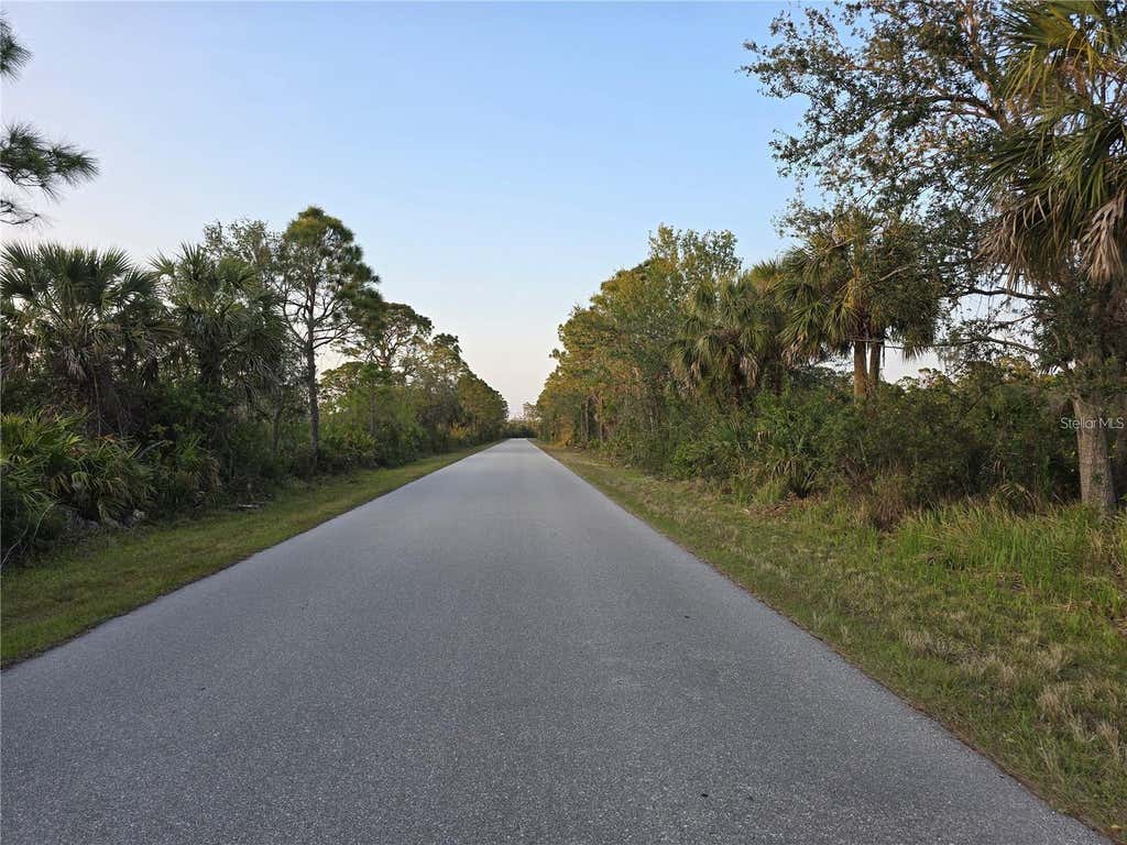 Photo of 2592 Mcphearson Drive, Port Charlotte, FL 33953 (MLS # O6424881)