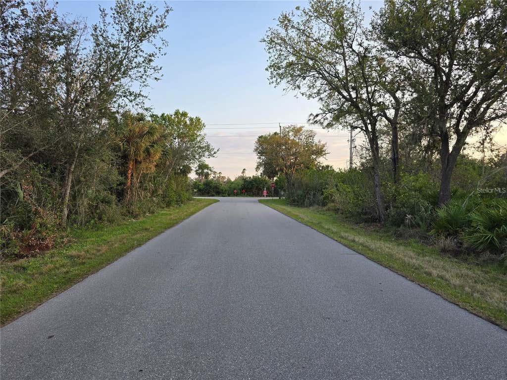 Photo of 2592 Mcphearson Drive, Port Charlotte, FL 33953 (MLS # O6424881)