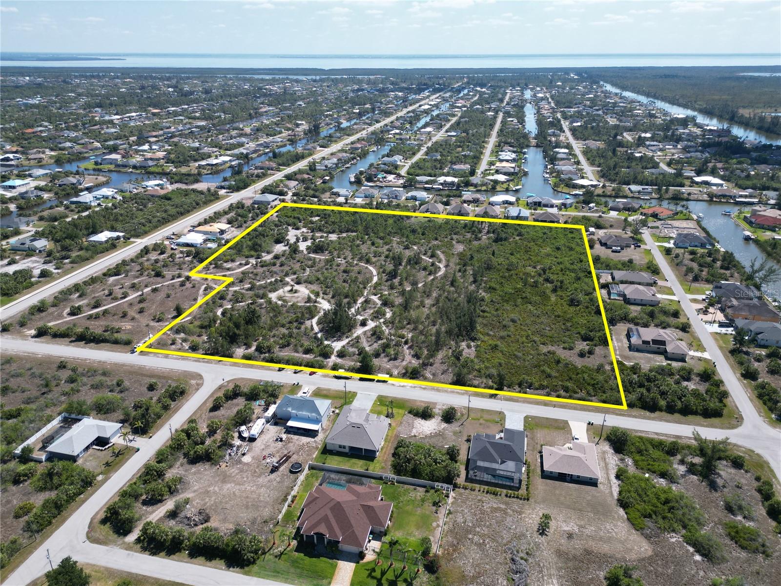 Owners want it Sold!!! Huge Price Reduction!!! 14.55 +/- Acres For Sale. Future Land Use is Park Lands and Facilities. See attachments for the allowable uses. The property is located in the Boating Community of South Gulf Cove just off Appleton Blvd. All utilities are in place making this a prime location to develop. New Home Construction has been booming in the area for several years creating a big demand for additional services. Acreage is hard to find for sale in the community, so contact me for more details. The Community consists of over 14,000 homesites; over 5,000 existing homes with many new homes under construction. General Range of Uses include, but not limited to; Government Office & Facilities, public schools, private schools, churches, auditoriums, playhouses, museums, private hospitals and utilities. (Future Land Use: Park Lands & Facilities) Bring Offers; Motivated Seller...