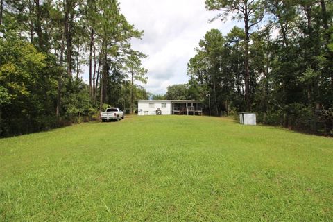 Photo of 205 Susan Street, Interlachen, FL 32148 (MLS # GC533710)
