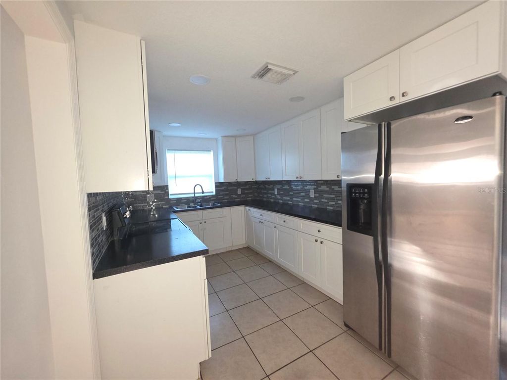 Photo of 1344 Wickham Lane, Holiday, FL 34691 (MLS # TB8465883)