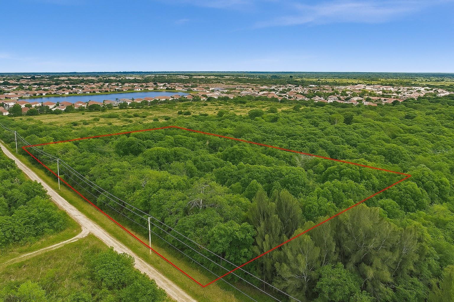 This 2.88-acre commercial parcel, comprising approximately 125,440 square feet, offers a significant development opportunity. The property is zoned CN (Commercial Neighborhood), a designation ideal for a variety of commercial ventures, and features approximately 548 feet of front footage. The lot may have access to public water and sewer utilities, which helps to streamline the development process.
The parcel's strategic location is a key factor in its value. To the east, the property is situated next to a parcel where the IndianRiver County School Board is planning a new middle school to accommodate the growth. The property also fronts a low-density residential community to both its west and south. This influx of residential and institutional development, including a new 55-plus residential community being built nearby, positions this parcel as a prime candidate for a commercial site that can serve the expanding population.
With widespread development occurring in the surrounding area, this property is positioned as a future phase of that growth. Its unique location at the intersection of residential, educational, and commercial expansion makes it a key investment for a developer seeking a well-positioned site in a thriving area.