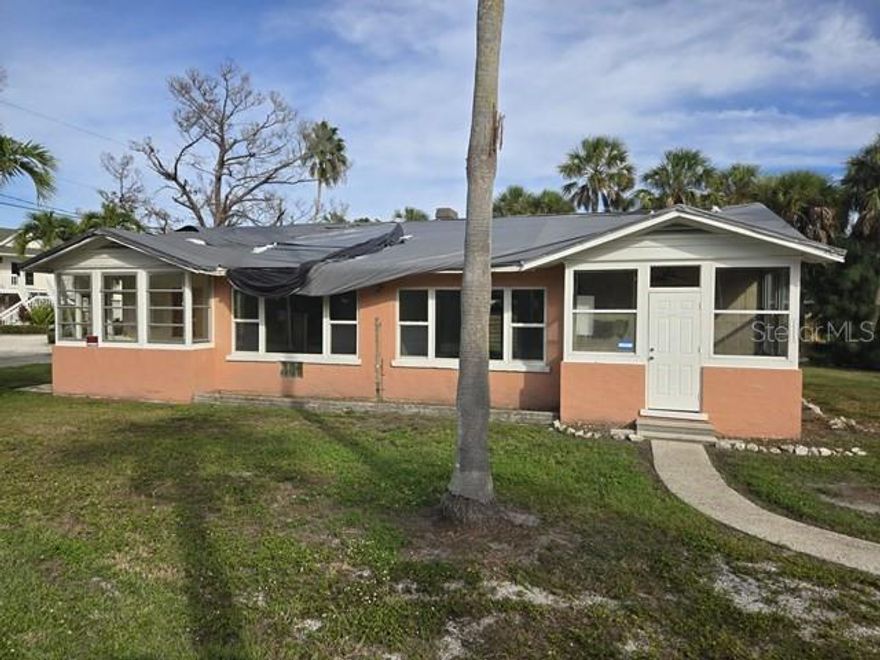 An exceptional opportunity on coveted Siesta Key, this duplex property with two units is offered as-is, with flexibility to restore the existing structure or rebuild to suit your vision. Situated on an expansive lot just minutes from Shell Beach and Siesta Key Public Beach, the property offers convenient access to world-famous sand beaches, dining, and shopping. Whether you are a builder, investor, or owner looking to create a custom coastal retreat or income-producing duplex, this property presents outstanding potential in one of Florida’s most desirable island communities. All offers are welcomed and encouraged.
