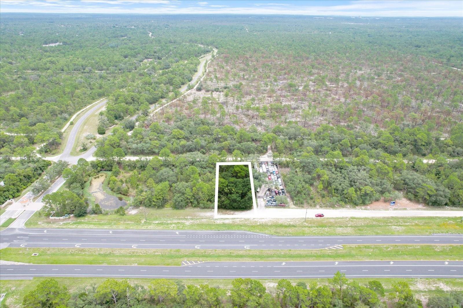 Discover the potential of this prime 0.38-acre C-2 zoned parcel, perfectly situated with extensive frontage on U.S. Highway 19 and additional rear road frontage. This high-visibility property offers excellent accessibility in a high-traffic area, making it ideal for a variety of commercial uses, including retail, office, or service-oriented businesses. With direct access to a major highway and the added convenience of rear road frontage, the location ensures maximum exposure and flexibility for customer access. Utilities are available in the vicinity, ready for connection. Seize this exceptional opportunity to establish or expand your business in a thriving commercial corridor—contact us today to explore the possibilities and secure this premium location for your venture! Owner financing available inquire for more details.