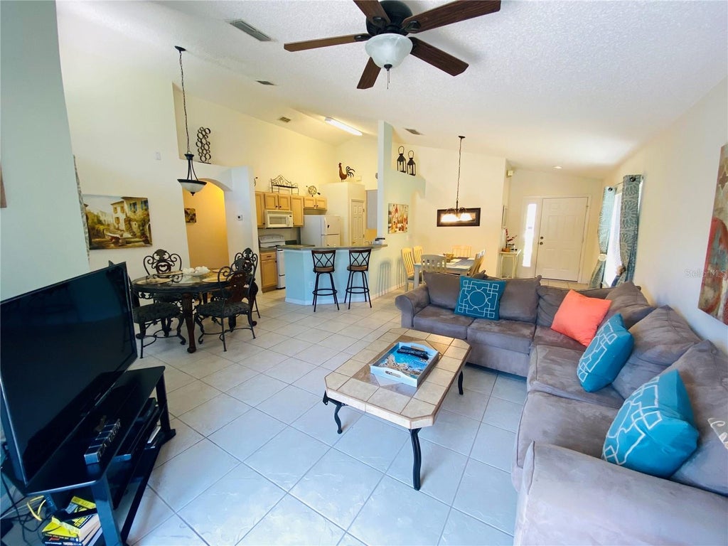 Photo of 8544 Sunrise Key Drive, Kissimmee, FL 34747 (MLS # O6432420)