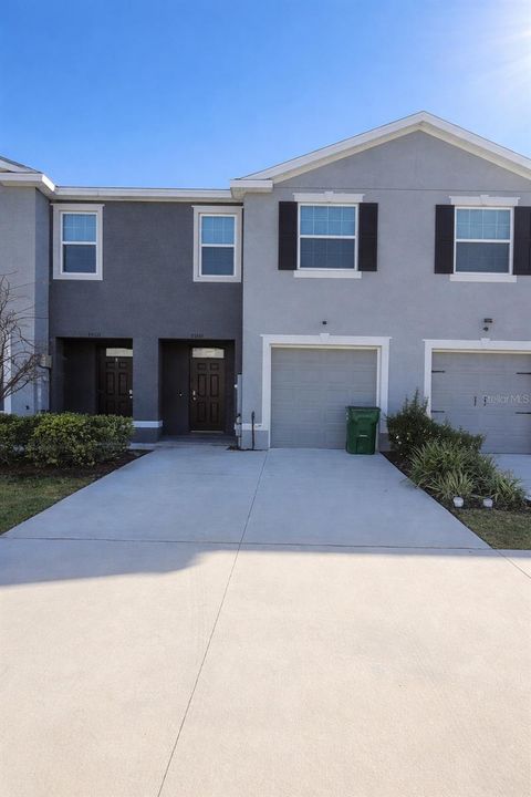 Photo of 33066 Tulip Petal Lane, Wesley Chapel, FL 33545 (MLS # TB8468092)
