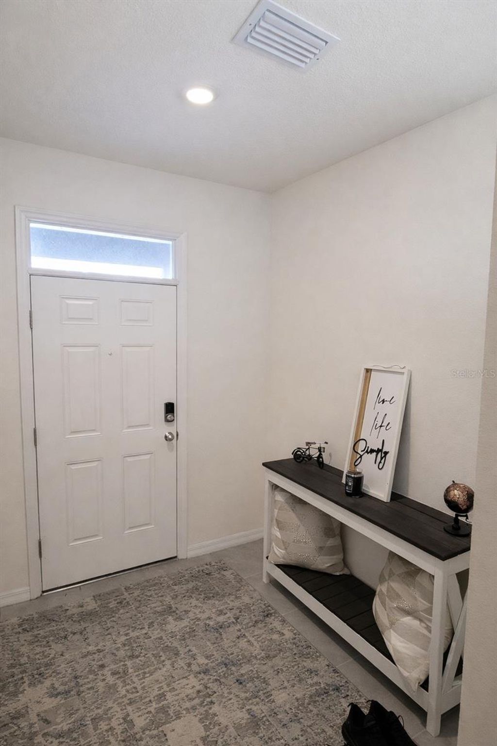 Photo of 33066 Tulip Petal Lane, Wesley Chapel, FL 33545 (MLS # TB8468092)