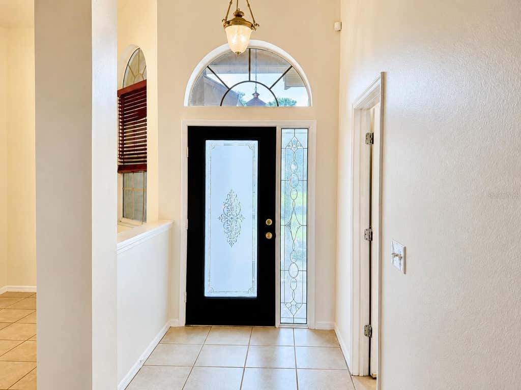 Photo of 1959 Wood Trail Street, Tarpon Springs, FL 34689 (MLS # TB8527477)