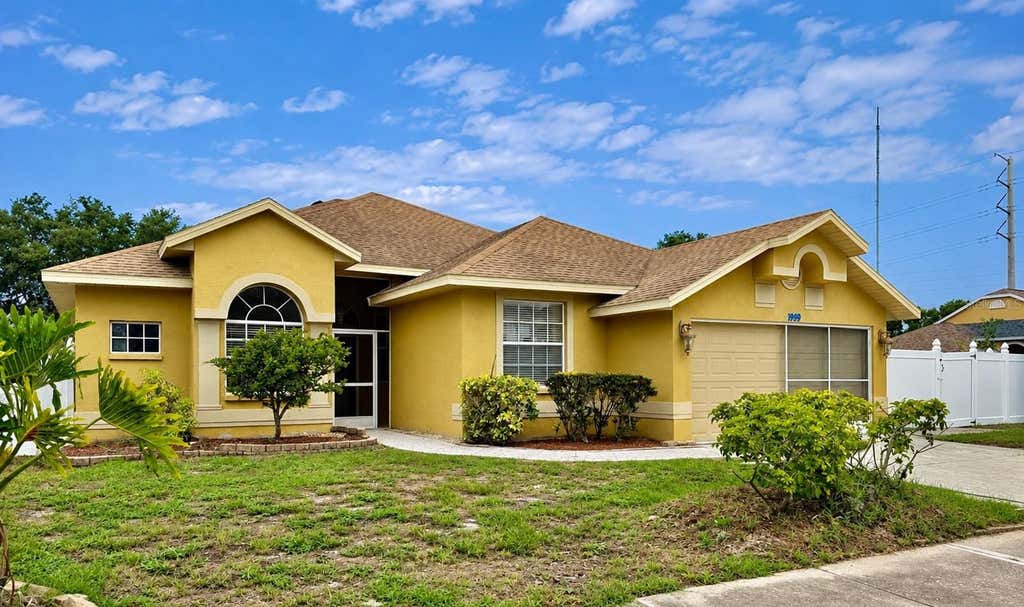 Photo of 1959 Wood Trail Street, Tarpon Springs, FL 34689 (MLS # TB8527477)