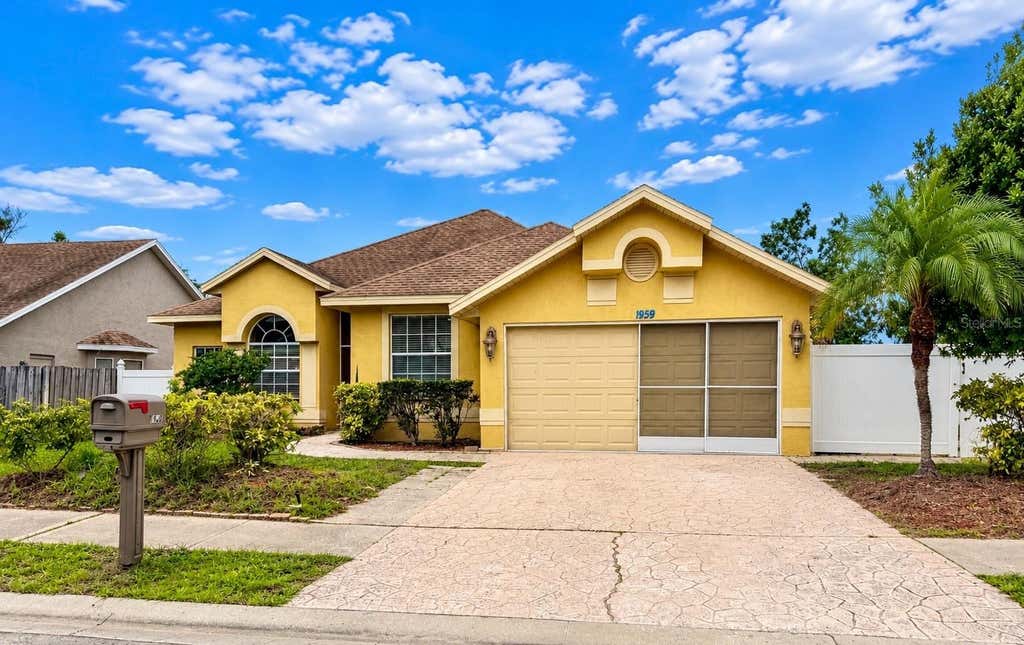 Photo of 1959 Wood Trail Street, Tarpon Springs, FL 34689 (MLS # TB8527477)