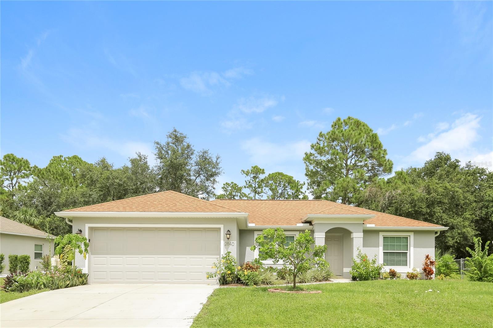 Discover this inviting 3-bedroom, 2-bathroom pet-friendly home with 1,437 sq. ft. of space. The kitchen is equipped with stainless steel appliances, including a refrigerator, microwave, range oven, and dishwasher, making meal preparation a breeze. This home features an attached garage and is complemented by ceiling fans and window coverings for enhanced comfort. Enjoy a relaxing soak in the bathtub after a long day. With ample amenities and space, this home offers comfortable living.