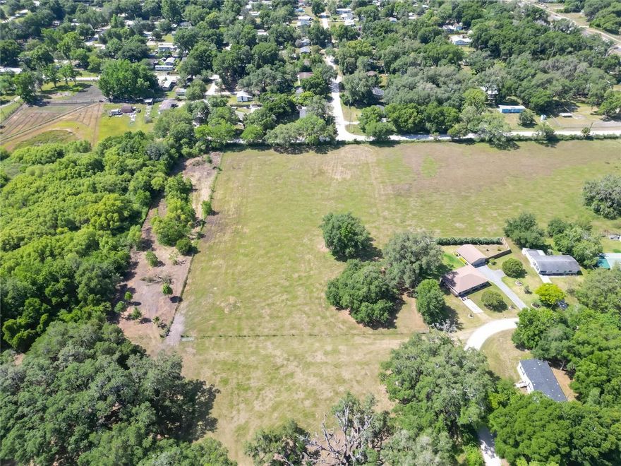 Prime Location! Total 17.71 acres in beautiful growing Dade City. Discover a rare opportunity with this recently updated lot boasting a myriad of modern conveniences. The owner has meticulously enhanced the property, bringing essential utilities such as electricity and a water well, ensuring seamless integration into the tranquil surroundings. Additionally, a charming mobile home has been thoughtfully placed on the lot, offering immediate comfort and versatility. Embrace the potential of the idyllic retreat, where every detail has been crafted for your convenience and enjoyment.