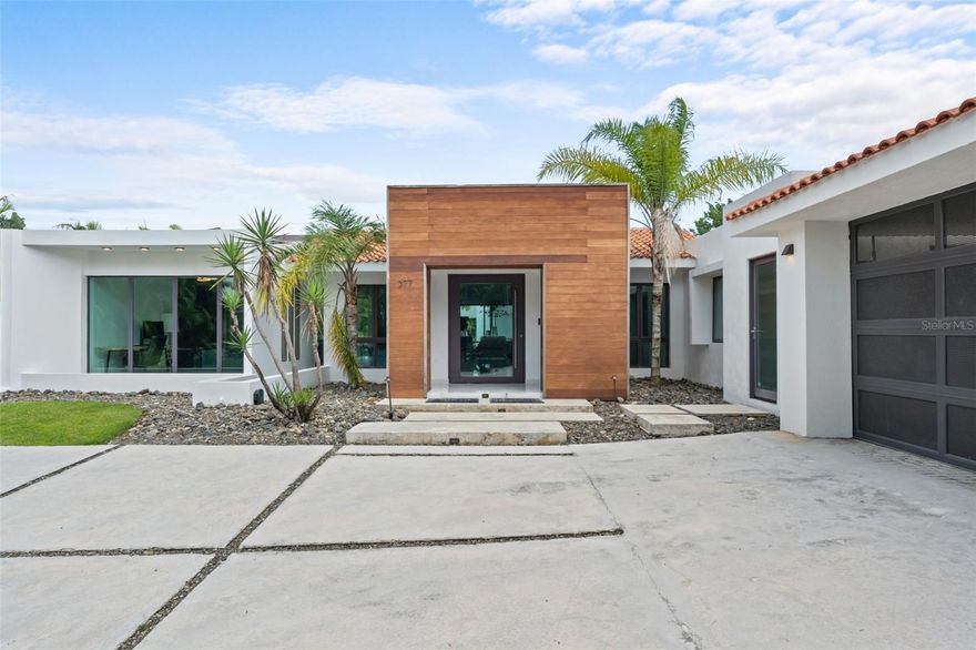 Located within the exclusive gated community of Dorado Beach East, this elegant single-level residence sits on a generous 1,921.49 sq. m. (0.47-acre lot), offering over 4,500 square feet of sleek, modern design and seamless indoor-outdoor living. With 4 bedrooms and 4.5 bathrooms, the home features a cool, refined palette, paired with custom lighting, high ceilings, and thoughtfully curated finishes throughout.

One of the bedrooms is designed with four built-in custom bunk beds and its own built-in closet, perfect for hosting family or guests. The open floor plan centers around a stylish kitchen outfitted with Wolf appliances, hidden cabinetry, a custom wine fridge, and clean-lined surfaces that flow into the spacious living and dining areas. Large sliding glass doors open to a pool terrace, creating a seamless connection to the outdoors.

The primary suite is a retreat of its own, with a tall-ceiling bathroom, blackout curtains, and a walk-in closet with built-in hampers. Every bedroom opens directly to the outdoor space, making the most of the lush surroundings and offering a constant connection to the outdoors.

Additional highlights include a mini powder bath, laundry room, and a detached 2-car garage. Outside, the pool, outdoor kitchenette, and grill island complete the ultimate setup for entertaining and enjoying Dorado’s coveted lifestyle. This property is a unique opportunity to own a stylish, modern home in one of Puerto Rico’s most prestigious resort communities.