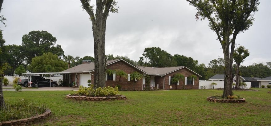 Located in South Lakeland, this corner home in a quiet upscale neighborhood. A very quiet area where people ride their golf carts and walk the neighborhood. All single family homes. I can't think of a better, safer place to live. Whole House Generac Generator with 250 Propane tank enough to power house completely for up to one month.Smart B-Hyve Sprinkler System. Completely updated with premium ceramic tile floors . Pool resurfaced including pool deck. Covered Barbeque area. Firepit in back yard. Completely fenced in with white vinyl. Restaurant quality under counter ice maker with crystal clear small cubes. NO HOA