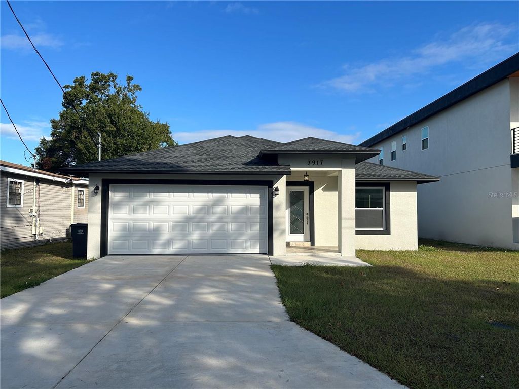 Photo of 3917 W Robson Street, Tampa, FL 33614 (MLS # TB8456872)