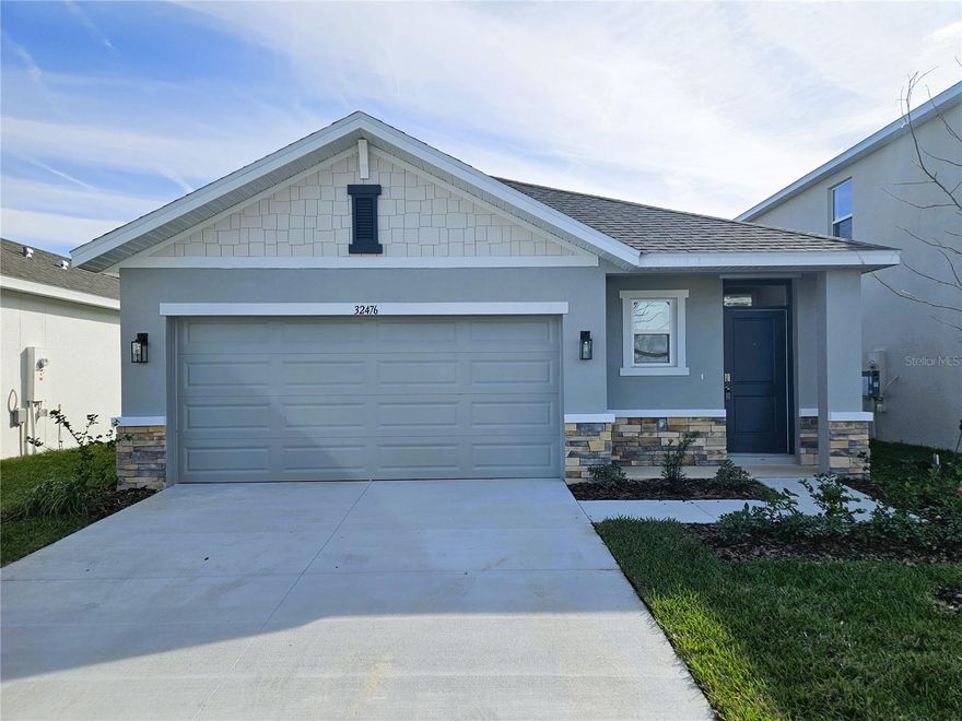 BRAND NEW DR Horton 3 Bedroom, 2 Bathroom Home on a Fenced Conservation Lot in the Wyndfields Community of Wesley Chapel. Just completed and ready for its first residents. The Color Palette and Interior Design feel Modern and Sophisticated with Gray Tones and attractive Woodgrain Luxury Vinyl Flooring. Such a stylish Kitchen with its contrasting Quartz Counters, Stainless Steel Appliances, White Shaker Cabinetry, and extended Island with Sink and barstool height Countertop. The Kitchen overlooks the Living Room and Glass Slider to the Backyard. Perfect for Entertaining. The Primary Bedroom is located toward the back of the Home. This large room has an En-Suite Bathroom, Ceiling Fan, and Walk-in Closet. The Primary Bathroom feels lush with a long Quartz Counter with two Sinks and a Tiled Walk-in Shower. The 2 additional Bedrooms are toward the front of the Home and have Carpet, Ceiling Fans, and large Closets. They share an eye-catching Full Bathroom with a Tub-Shower. You will enjoy the outside year-round under the Covered Rear Porch overlooking a Conservation Area and the Fully Fenced Backyard. Private and Peacefull with no rear neighbors. The Wyndfields Community is a New Neighborhood wedged between SR56 and Meadow Pointe Boulevard. It has great access to Restaurants, Shopping, and Activities. Community Amenities include a Clubhouse with multiple Pools, Cabanas, Parks, and Playgrounds. Pets permitted (pet screening and owner approval are required). $350 Non-refundable Pet Fee for each pet. The property is Professionally Managed and Maintained. There is a one-time $150 Administration Fee and $75 Application Fee for each applicant 18 years or older. Applicants should have a minimum 650 Credit Score, Gross Monthly Income of at least 2.5 times the Monthly Rent, and stable Rental History (no Evictions or Tenant Collections).