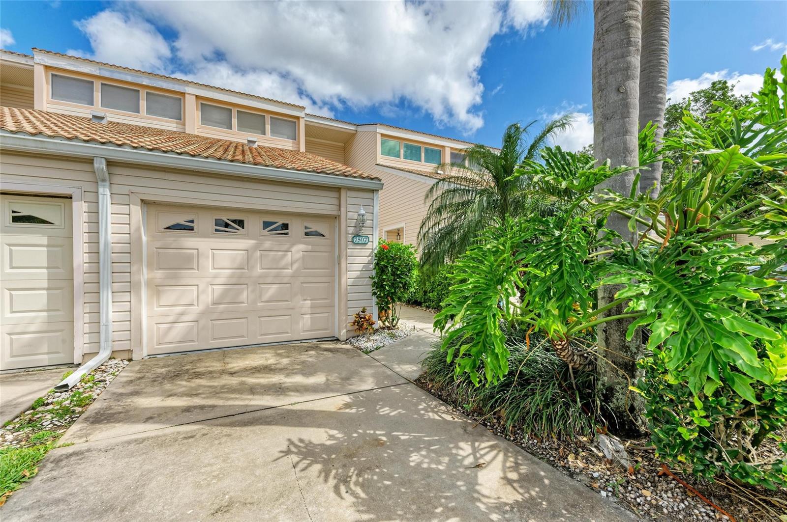 Welcome to The Preserves at Palm Aire! This beautiful 2 bedroom, 2 bath home has direct golf course views and features cathedral ceilings, tons of natural light, a wood burning fireplace, and screened lanai. This home features two primary suites with walk-in closets, one on each floor, with sliding doors to outside patios. The downstairs kitchen had renovations including tile floors, granite countertops, and stylish backsplash, and has a breakfast bar, plenty of storage with a pantry and cabinet space, and stainless steel appliances. The additional upstairs loft space can be used as an office or den. This home comes with an attached 1 car garage, a unique barn door laundry room, and additional pantry storage. The Preserves has its own private community pool and is a short distance from the optional, and affordable, Private Palm Aire Country Club that includes tennis, fitness, swimming, dining, and two 18 hole golf courses. All of this conveniently located near UTC Mall, shopping, restaurants, downtown Sarasota, SRQ Airport, I-75, and the world famous beaches of Florida's Gulf Coast! Don't miss out on this hidden gem!
