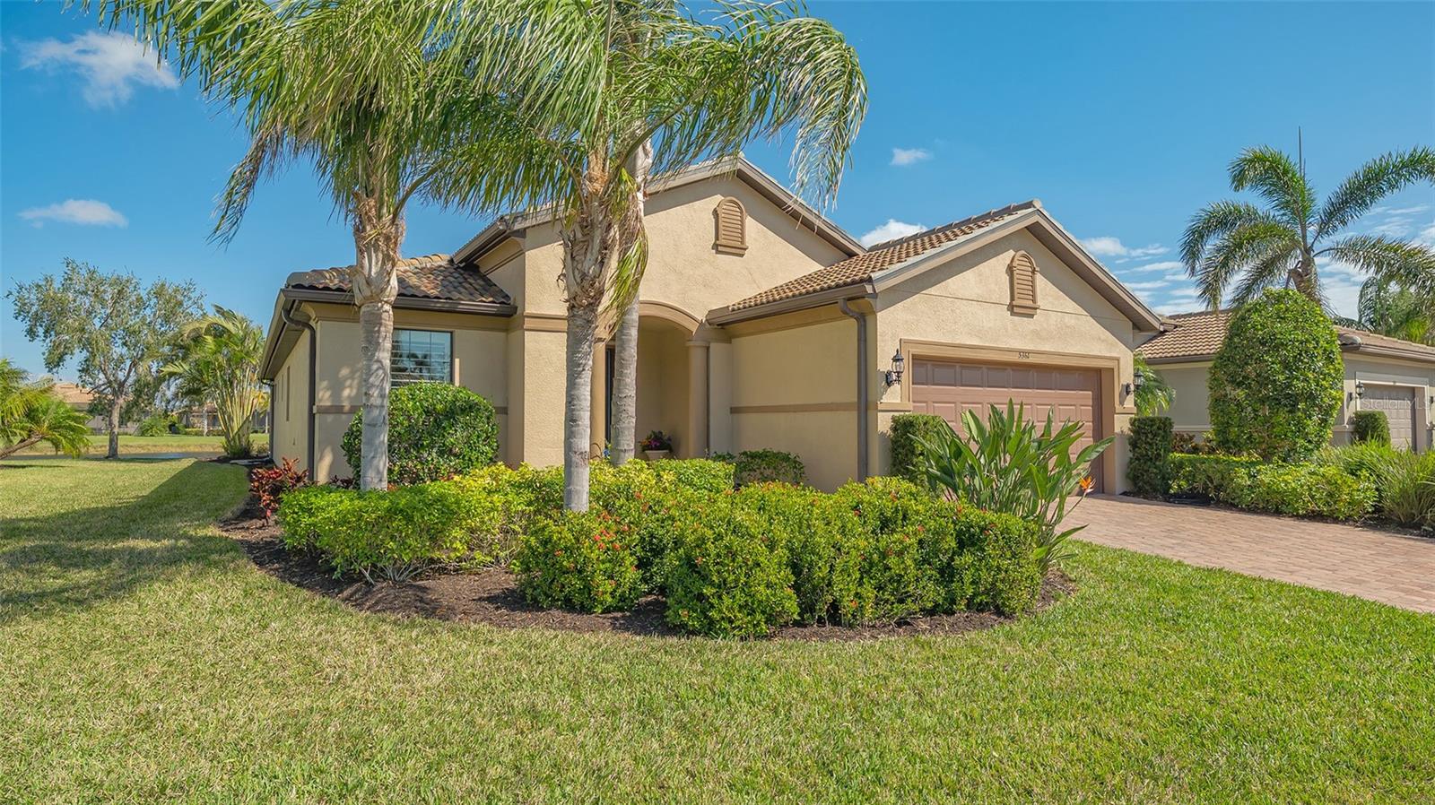 Make this beautiful retreat-like home with peaceful indoor & outdoor space in a community oriented neighborhood your own. Located in the heart of Palmer Ranch in Sandhill Preserve a newer resort style community just a short distance from world famous Siesta Key Beach, this popular Martin Ray floorplan by Divosta Builders has a lot to offer. It features 3 bedrooms, 2 full baths, a den, an extended 2 car garage & hurricane shutters. The highlight of the home is an extended lanai with a spool ( a large hot tub) & built in grill with kitchen for entertaining & relaxation. The backdrop of the lake provides the tranquility of nature, Other upgrades include a built in bar with wine frig, a pocket door added to the guest area for privacy & a den with glass French doors. Sandhill Preserve is one of Palmer Ranch's newer communities with only 308 homes* The community features a community pool, jacuzzi, fitness center, pickle ball, club house, fire pit, barefoot bar area tennis & more. Located in the heart of Palmer Ranch just minutes from world famous Siesta Key beach, shopping, restaurants & Legacy bike trail. Furniture available at additional cost.