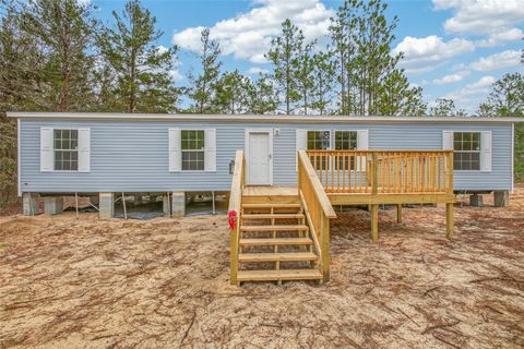 Photo of 419 Lily Trail, Interlachen, FL 32148 (MLS # GC537322)