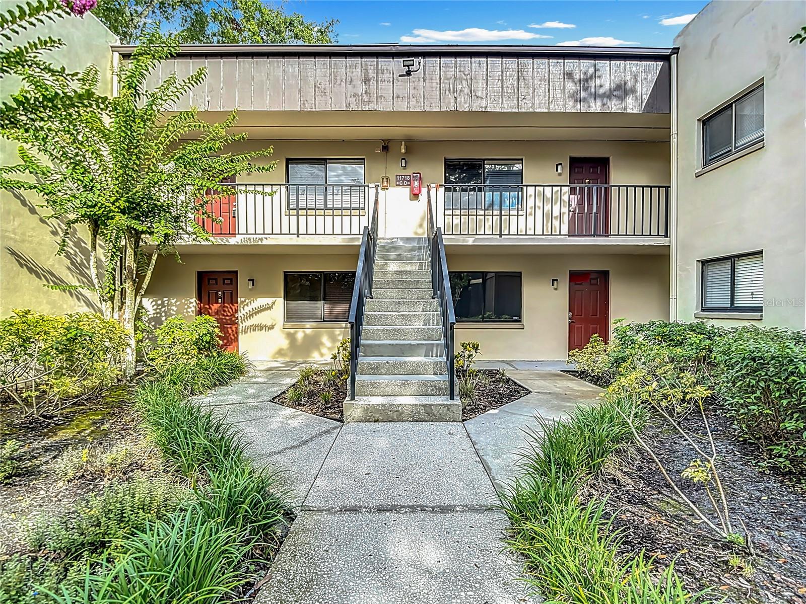 Move-In Ready 2BR/2BA Condo – Minutes from USF, with Serene Views & Resort-Style Amenities Welcome to 11718 Raintree Village Blvd Unit C – a beautifully updated and move-in ready second-floor condo nestled in the heart of the highly desired Raintree Village community. Just minutes from USF, Moffitt Cancer Center, the VA Hospital, and Busch Gardens, this spacious second floor 2-bedroom, 2-bath unit offers the perfect combination of comfort, convenience, and value. Step inside to an open-concept layout featuring tile flooring in the living areas, bedrooms, kitchen and baths. The kitchen is both stylish and functional, with white cabinetry, black granite tile countertops, custom lighting and stainless steel appliances. Enjoy a bright, inviting living and dining area, ideal for entertaining or everyday living. The primary suite offers a large walk-in closet and a private en-suite bath with a walk-in shower. The second bedroom is generously sized with ample closet space. Both bathrooms have been tastefully updated. The hall bath has a tub with an updated tile surround. Relax on your private screened patio, which offers peaceful, wooded views—perfect for morning coffee or evening unwinding. Additional features include a utility room with a full-size front-load washer and dryer, ceiling fans, raised six panel doors and plenty of storage throughout. Residents of Raintree Village enjoy resort-style amenities including 2 swimming pools, tennis and racquetball courts, walking trails, and a clubhouse. Condo fees are low and include water, sewer, trash, basic cable, and internet, making this an excellent option for first-time buyers, investors, or anyone seeking easy, low-maintenance living. With reserved parking space #4-18C, ample guest parking, and a minimum 1-month rental policy, this condo is ideal for seasonal use, long-term investment, or year-round enjoyment. Flood Zone X - No Flood Insurance Required. Centrally located near USF, Busch Gardens, MOSI, Lettuce Lake Park, University Mall, and I-75/I-275 for easy commuting. Don’t miss your chance to own this charming, affordable condo in one of Tampa’s most convenient locations.