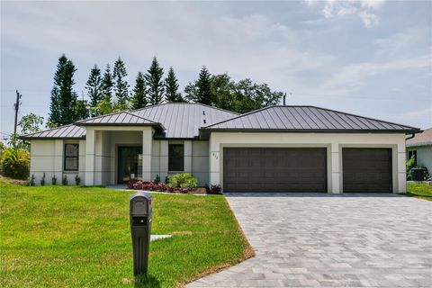 Photo of 812 SW 14th Avenue, Cape Coral, FL 33991 (MLS # A4693978)
