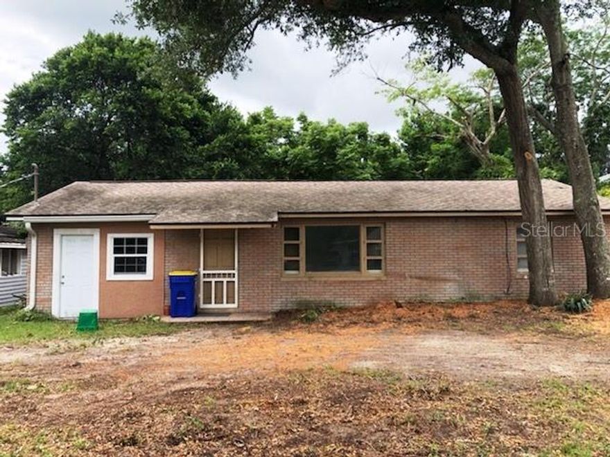 Handyman Special – Are You Up for the Challenge? Long-Term Tenant has vacated. This FORMER cozy & comfortable Bungalow may be a challenge, but it has Tremendous Potential! Imagination, Toolkit & Lots of TLC needed!! Being Sold As-Is. HOME IS IN NEED OF REPAIR. Concrete Block Construction/Face Brick, Semi-Circular Driveway, Large Lot (75’x151’) with backyard access for RV/Boat Parking. Treed Lot with many Mature Oaks. Re-Roof in February 2014. Currently has 2BR/1BA, but the “Bonus Room” offers the perfect opportunity to add a 3rd Bedroom & 2nd Bath. Kitchen Range & Hot Water Heater are Natural Gas. Great location, between US-1 & the Indian River (Intracoastal Waterway) with Easy Access to US-1, State Road 442 & I-95. Flood Zone X. Edgewater is a unique & developing Intracoastal Waterfront Community, located alongside the Indian River Lagoon. Less than 10 Minutes to 13 Miles of Sandy Beaches! Quaint New Smyrna Beach and Daytona Beach, home of the ''World's Most Famous Beach'', are a short drive and the Orlando Attractions are located in close proximity! Come and Discover the City of Edgewater, a well-established area with 146 Acres of Parkland, offering a variety of uses from picnicking, fitness trails, swimming, fishing, tennis, football, racquetball, baseball, bicycling and more - you'll always find something to do! The Riverwalk along scenic Riverside Drive has become a popular place for walkers, bicyclists and nature lovers. The Lagoon, known as the Underwater Rain Forest is a very short distance and Edgewater's quiet, small town charm has earned the title of "The Hospitality City"! This Location has So Much to Offer & this home has Potential Plus!! ;Water: City