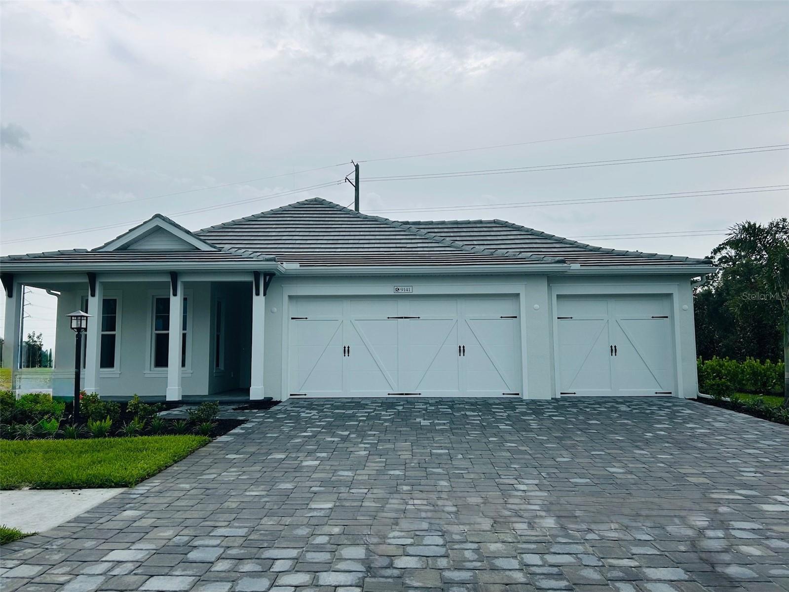 Come enjoy this ready to move in to home in desirable Shellstone at Waterside. The home features beautiful large plank tile through out, quartz kitchen counters with a gourmet kitchen and an oversized 3 car garage. The Halyard is one of the most sought after Homes by Towne plans that offers a spacious feel and a quality build. Surround yourself with nature on the private, over sized homesite.
Shellstone is an amenity rich community that offers walking trail and 2 state of the art amenity centers. The Summit is scheduled to be completed the summer of 2026 and you will enjoy a social hall, fitness center, pool, spa, firepit, poolside cabanas and poolside BBQ grills a fitness lawn. MIDWAY is in and fully operational with an activities director on staff. This amenity has a pro shop, play areas, dog parks , 8 pickle all courts, 6 tennis courts, a full length basketball court, kayak launch and picnic areas.