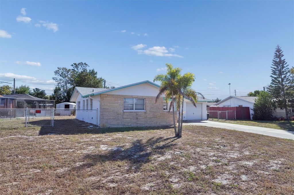Photo of 7608 Redcoat Avenue, Port Richey, FL 34668 (MLS # TB8456090)
