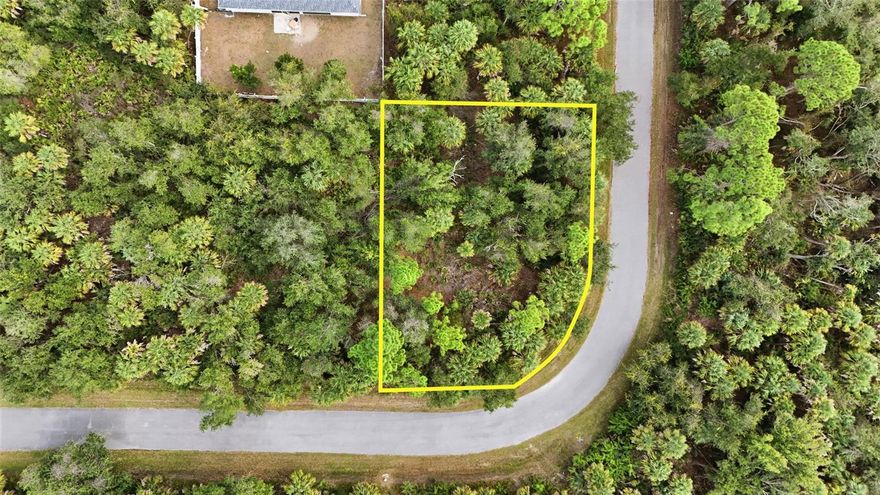 Oversized Corner Lot in the Heart of North Port. This 11,908 sq ft corner lot offers a strong opportunity for homeowners, builders, and investors alike. With wraparound frontage and an elevated setting, the property sits high and dry outside of a flood zone, providing year-round peace of mind. Tucked into a low-traffic area of North Port, this homesite offers a sense of peace and privacy, while remaining just minutes from shopping, dining, and recreation—giving you the best of both worlds. Enjoy the freedom of NO HOA restrictions and NO CDD fees, allowing you to build, hold, or invest on your terms. This property appeals to a range of buyers, tenants, and builders, offering flexibility and long-term potential. Nearby highlights include CoolToday Park (Atlanta Braves spring training), the North Port Aquatic Center, and Cocoplum Village Shops for everyday convenience. You’re also close to top-rated schools and within an hour of Southwest Florida’s Gulf beaches. With space to accommodate a home, garage, pool, or outdoor living, this lot is ready to support both comfortable living and long-term value. Call the listing agent today for details and start shaping your vision.