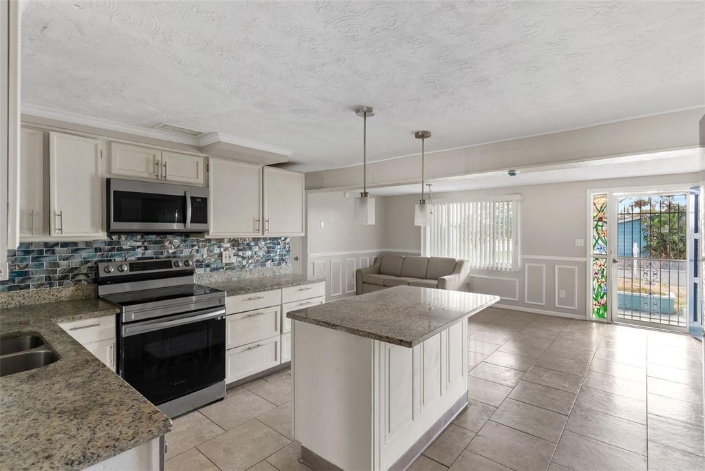 Photo of 2344 Tahitian Drive, Holiday, FL 34691 (MLS # TB8501320)