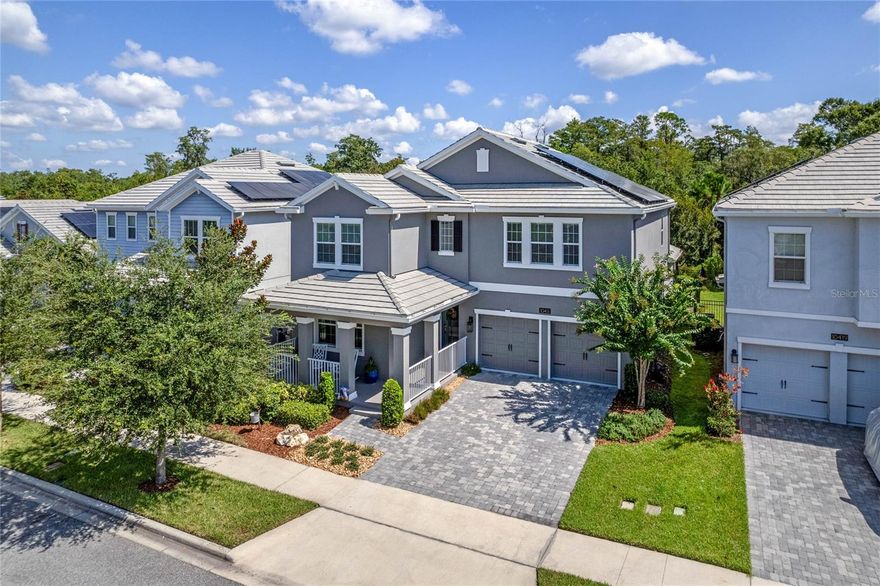 Welcome to this incredible Solar-Powered home that is nothing short of a work of art! Located on the GATED side of Storey Park featuring 5 bedrooms, 3.5 baths, a 3 CAR TANDEM GARAGE with a MAIN FLOOR OWNER'S SUITE and (2) LAUNDRY ROOMS - this one is like no other home in the community! Boasting a Slate Tile Roof with a spacious Front Porch and Screened Lanai for peaceful CONSERVATION Views. Prepare to be awed by the completely remodeled Owner’s Bath Suite and Powder Bathroom that emanate COMFORTABLE LUXURIES. The Owner’s Suite features Luxury Vinyl Plank flooring and a huge Walk-In Closet with Custom Built-Ins. And the bathroom has been completely redone with a freestanding tub, new cabinets, mirrors, wall tile - this room feels like a high end hotel bath suite! In the Living Room, you'll find a Custom TV Wall enclosing an ELECTRIC FIREPLACE that enhances the relaxing ambiance of the space, allowing you to soak in the tranquility that surrounds you with backyard nature views framed by a wall of windows. Upstairs, a 546 square foot LOFT AREA welcomes you, providing an ideal space for a movie or game room. The (4) Secondary Bedrooms are generously sized, each measuring at least 13x14 feet and offering either a Walk-in Closet or a Double Closet. The two full upstairs bathrooms come complete with double sinks in each and feature doors that separate the shower area for added privacy. Equipped with a Whole Home Water Filtration System, Rain Gutters, a Wrought Iron Fence, and a new Water Heater in 2021. The garage has been finished with Epoxy Paint, along with New Exterior and Interior Paint in 2023. HOA dues include high-speed internet, 300 cable channels, and home phone. Storey Park amenities include a resort-style pool, tennis courts, 24-hour fitness center, clubhouse, on-site HOA management, 24-hour roaming security, dog park, playgrounds, and miles of natural trails, providing every luxury amenity you could ask for in a community. This well-maintained home is conveniently located off the 417, with easy connectivity to 528, I4, and just minutes away from everything Lake Nona has to offer! A MUST SEE - Convenience and elegence await! Copy and Paste Video: https://youtu.be/DuS9Ca8RNIY?si=e-_9bHnzoK5qfBhb