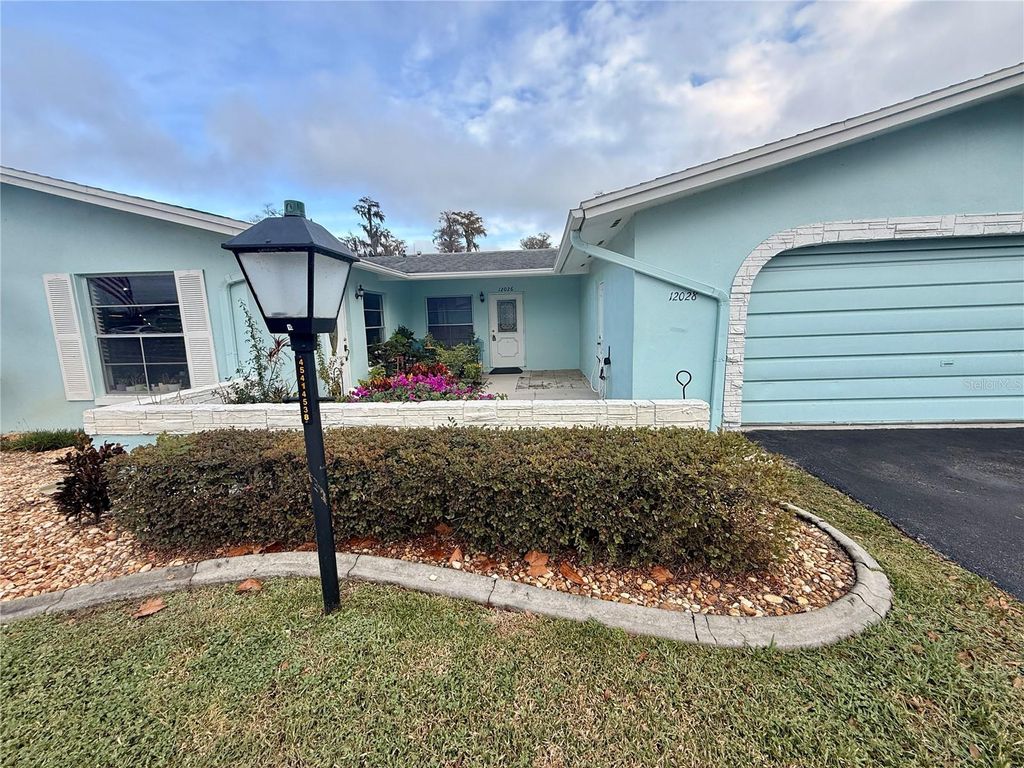 Photo of 12026 Boynton Lane, New Port Richey, FL 34654 (MLS # W7881195)
