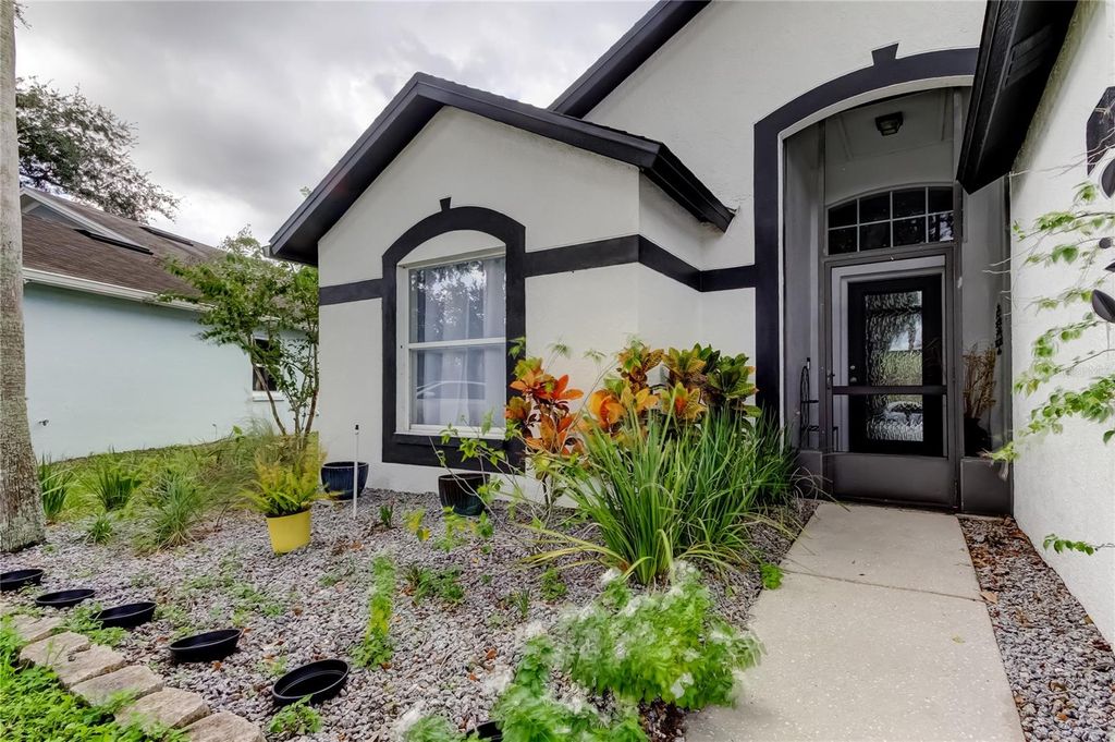 Photo of 1941 Tinker Drive, Lutz, FL 33559 (MLS # TB8440907)