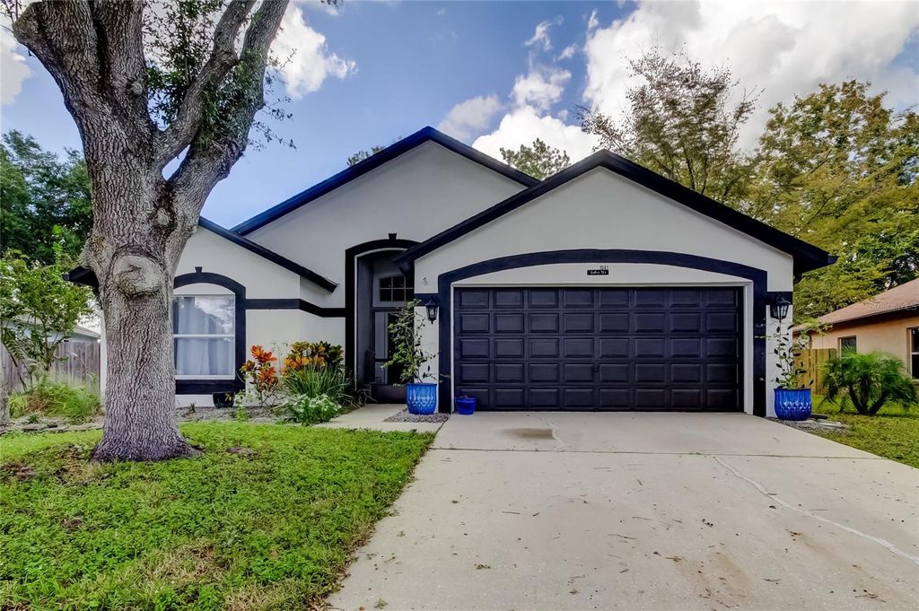 Photo of 1941 Tinker Drive, Lutz, FL 33559 (MLS # TB8440907)