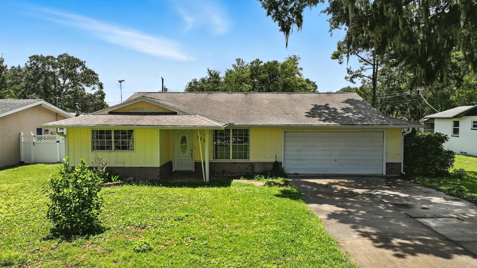 One or more photo(s) has been virtually staged. This 3-bedroom, 2-bathroom pool home sits on a spacious lot with a fantastic layout and plenty of room to make it your own. With great bones and a layout designed for entertaining, this fixer-upper offers a rare opportunity for homeowners and investors alike. Enjoy indoor and outdoor living with a kitchen that overlooks the pool deck and backyard, ideal for gatherings and relaxing weekends. The large driveway, 2-car garage, and indoor laundry with a sizable utility room add convenience and functionality. Located just 10 minutes from all the best of Daytona Beach, including Downtown Beach Street's restaurants and entertainment, the beach, the Intracoastal, and the world-famous Daytona International Speedway, you'll be close to everything. Whether you're looking to create your dream home or add to your investment portfolio, this property delivers. A professional rental analysis forecasts a rental rate of $2,400 per month, making this the lowest priced pool home currently on the market in Volusia County with excellent upside potential.