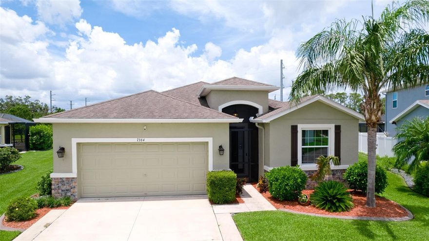 Welcome to this immaculately maintained original home in the desirable community of Stoneledge. With 3 bedrooms, a den, and 2.5 baths across 2,035 square feet, this residence offers a seamless blend of comfort, style, and thoughtful upgrades. Nestled on a fully fenced homesite overlooking a tranquil pond, the backyard is your private oasis—complete with an extended screened lanai, pavered patio, Edison-style lighting, and concrete under the rear fence for added security. Enjoy spectacular evening sunsets right from your backyard. Inside, you’ll find tile flooring throughout the main living areas, luxury vinyl waterproof plank flooring in the office, and carpet in primary & one guest bedroom. The wide entry foyer, custom crown molding, updated baseboards, and plantation shutters at the dining room and office enhance the home’s elegant character. The gourmet kitchen is equipped with stainless steel appliances, 42-inch wood cabinetry, granite countertops, under-cabinet lighting, USB-equipped, pendant lights over the island, and slide-out drawers in the lower cabinets. A pantry with durable steel shelving completes the space. Additional highlights include: Accordion and roll-down hurricane shutters throughout, included generator, 20-amp service in the den for an extra fridge or freezer, Primary suite with double vanities, soaking tub, and separate shower, large front-load washer and dryer with storage shelves, closet upgrades with double-door entry and blackout curtains in one guest room. Low monthly HOA of just $92, covering ponds, common areas, entrance, dog park, and mailboxes. New AC system (Feb 2024) with transferable 10 year warranty. Average electric bill of just $125/month. Every detail has been thoughtfully designed and lovingly cared for—this is truly a move-in-ready gem in a sought-after neighborhood.