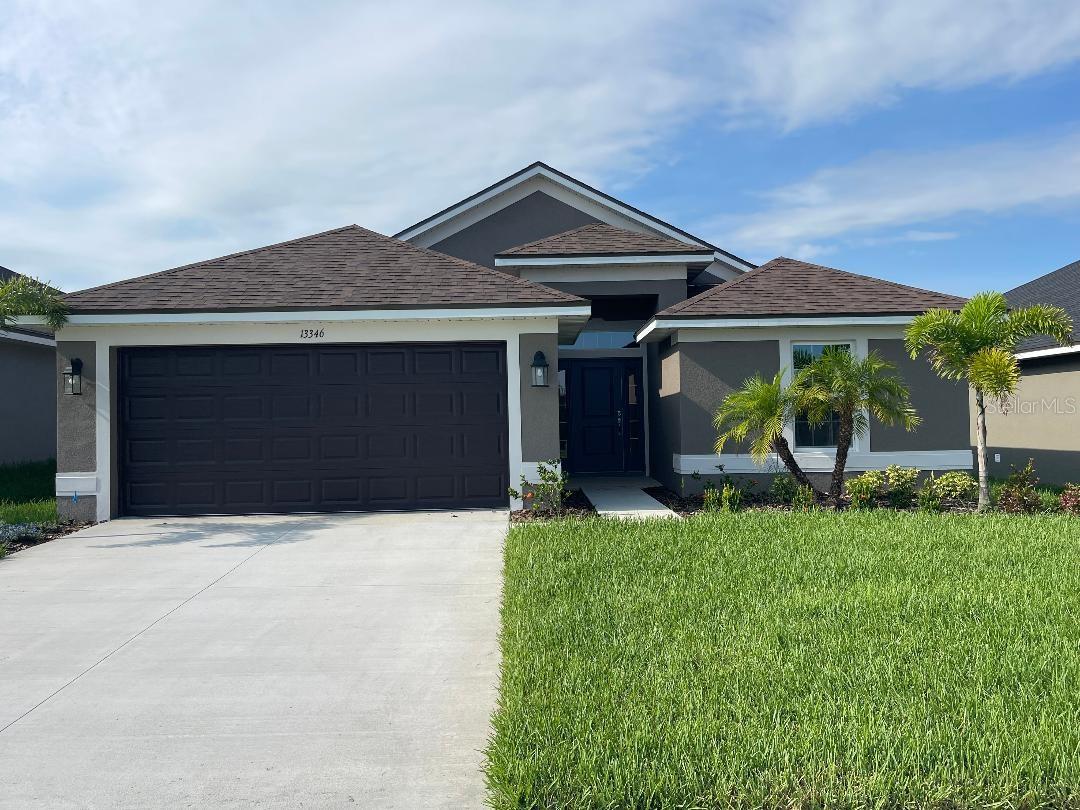 Brand-new and move-in ready—just minutes from downtown Dade City!
This 4-bedroom, 2-bath home offers 1,635 square feet of modern comfort with all the features today’s buyers love. You’ll find plank tile flooring throughout the main living areas, granite countertops in the kitchen and baths, and soft-close cabinets that add a touch of luxury.
The kitchen is stylish and functional with Moen faucets and sleek finishes, while the primary suite feels like a retreat with dual sinks, a tiled shower with a glass door, and plenty of space to unwind. Energy-efficient dual-pane Low-E windows help keep things comfortable year-round. And with Burks Park just steps away and local shops and restaurants right down the road, the location is spot on for easy Florida living. Come see what new construction living feels like in Dade City! **Ask about our special incentives**