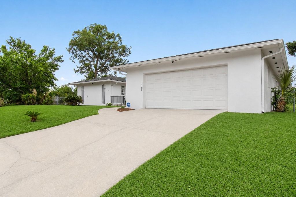 Photo of 1700 Needlewood Lane, Orlando, FL 32818 (MLS # O6417629)