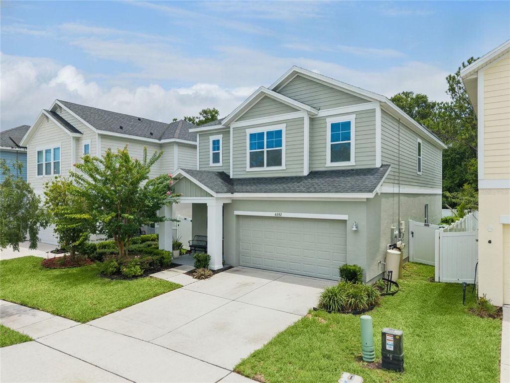 Photo of 4222 Hibiscus Bloom Drive, Orlando, FL 32822 (MLS # O6421699)