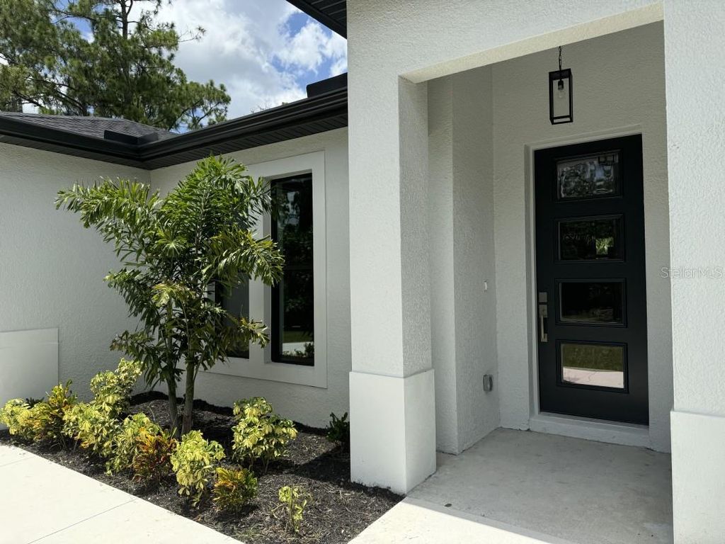 Photo of 14390 Maddock Avenue, Port Charlotte, FL 33953 (MLS # A4671547)