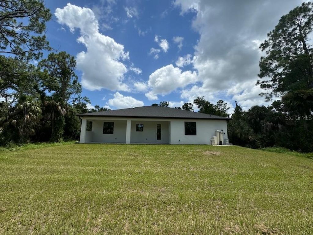 Photo of 14390 Maddock Avenue, Port Charlotte, FL 33953 (MLS # A4671547)