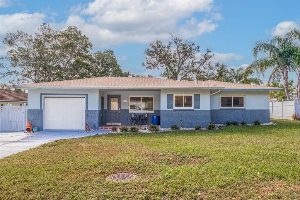 Photo of 3282 Honeysuckle Road, Largo, FL 33770 (MLS # TB8426782)