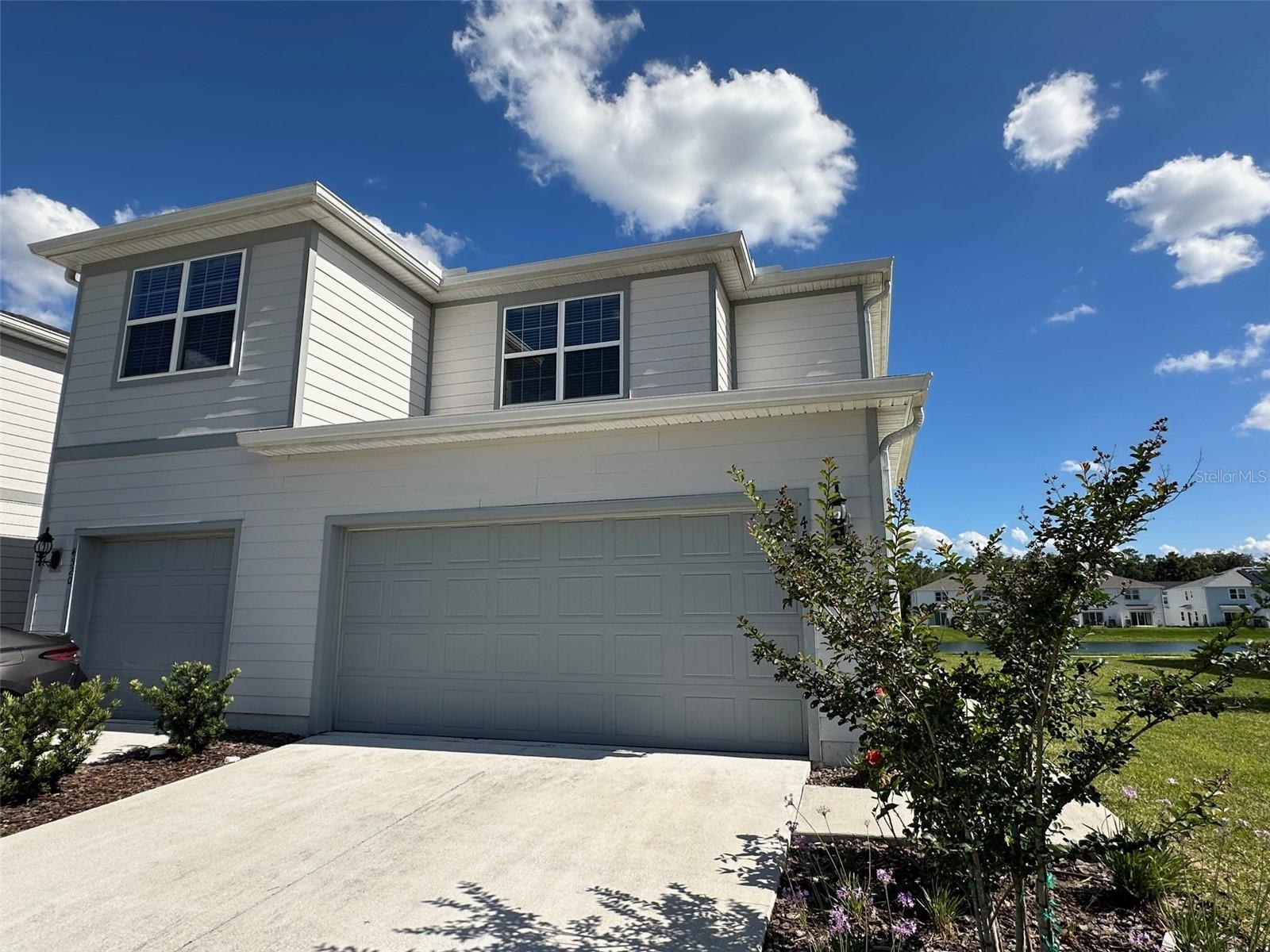 Welcome to Cypress Cay. This gorgeous two-story townhome is move in ready. 3 bedrooms, 2 full bathrooms, a powder room, a two-car garage, and a back patio. The spacious first floor is ideal for entertaining, featuring a powder room and an open concept gathering room, café and kitchen. The Owner's Suite features a spacious walk-in closet and en suite bathroom with a double sink granite-topped vanity, linen closet, private water closet and walk-in shower. Two additional bedrooms, the secondary bathroom and the laundry are also on the second floor, offering privacy and space for everyone. Rent includes Cable, Internet and Lawn care.