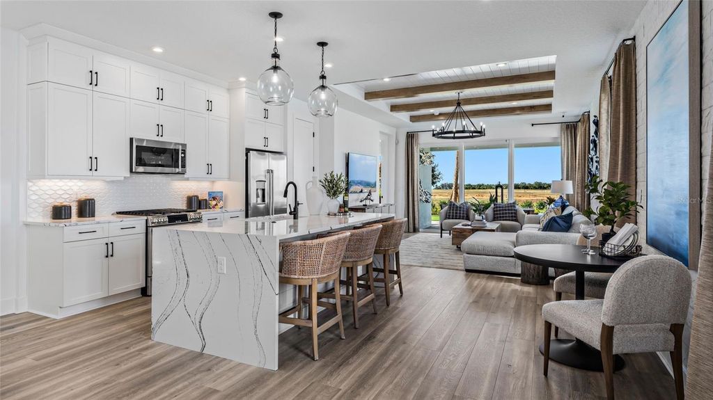 Photo of 1448 Santorini Way, Tavares, FL 32778 (MLS # W7882928)