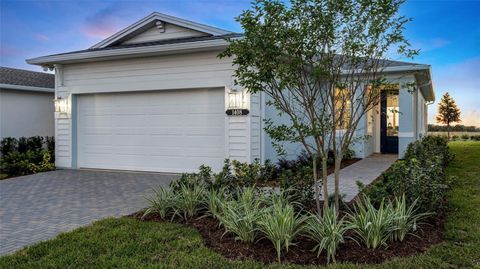 Photo of 1448 Santorini Way, Tavares, FL 32778 (MLS # W7882928)