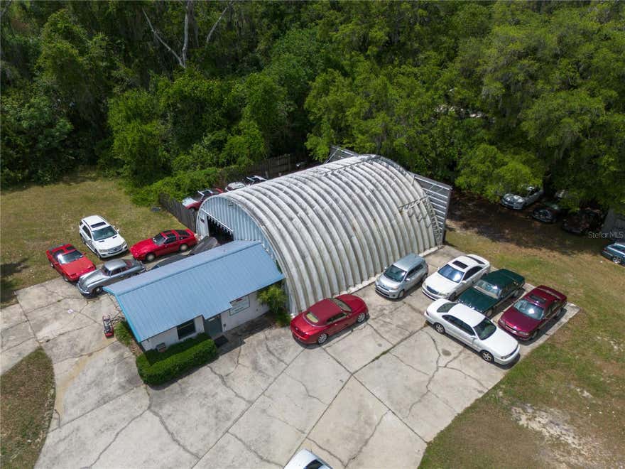 Positioned on highly visible US-441 in Ocala, this exceptional commercial opportunity combines an established automotive business of over 44 years with valuable real estate and expansion potential. Situated on just over an acre and being offered with an additional 2.73 acre parcel, the property features an existing and operating auto repair shop complete with three service bays and 575 feet of road frontage, providing outstanding exposure and accessibility.

Zoned B4 Commercial, the property allows for a wide range of potential commercial uses while offering immediate income-producing capability for an owner-operator or investor. The sale includes the business, equipment, computers, a 15 year office manager and a very good service tech creating a true turnkey opportunity for someone looking to step into a fully operational automotive repair operation without the expense and delay of starting from scratch.

In addition to the existing infrastructure, the expansive acreage provides significant room for future growth and development. Whether expanding the current operation, adding additional service facilities, increasing storage capacity, or exploring complementary commercial ventures, the property offers flexibility rarely found along one of Ocala’s major commercial corridors.

With strong visibility, established operations, substantial frontage on US-441, and valuable commercial zoning, this property represents a unique opportunity to acquire both a functioning business and a strategically located commercial asset in a growing market.  The current owner is willing to assist with transition following the sale.  Additional parcel is 3728 N US Hwy 441, Ocala, FL. Call us for a tour today!